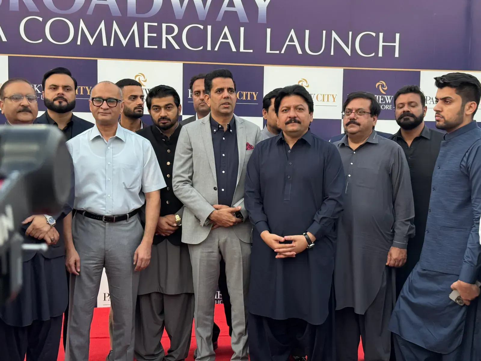 Press scrum at the Broadway Commercial Launch.